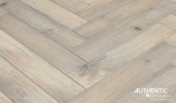 Bleached beech herringbone laminate flooring